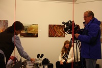 news crew filming event